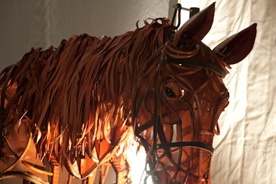 In addition to the riders that stood at the entry to the tent, the planners brought in one of the horse puppets used in the War Horse production. Puppeteers operated the piece to engage with guests during the evening and signal the start of the auction.