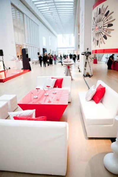 Sleek, red and white lounge areas provided seating.