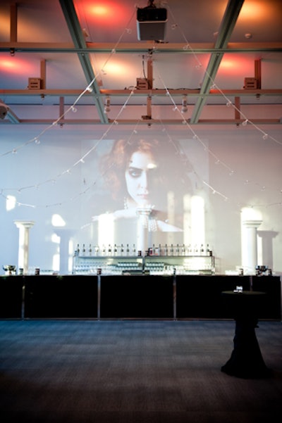 Projected images of a modern reincarnation of the Marchesa played into the decor.