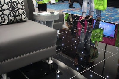 Wizard Connection displayed its new acrylic twinkle dance floor, which has white lighting embedded in either black or white two- by two-foot tiles.