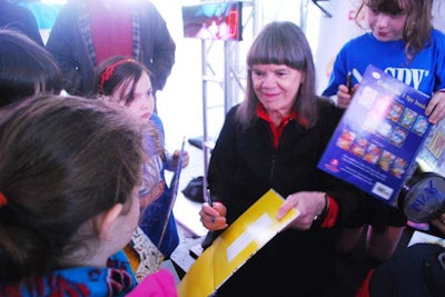 The yearlong campaign to mark the I Spy franchise's 20th year also included a scavenger hunt event with Marzollo (pictured center) at the Scholastic headquarters in SoHo.