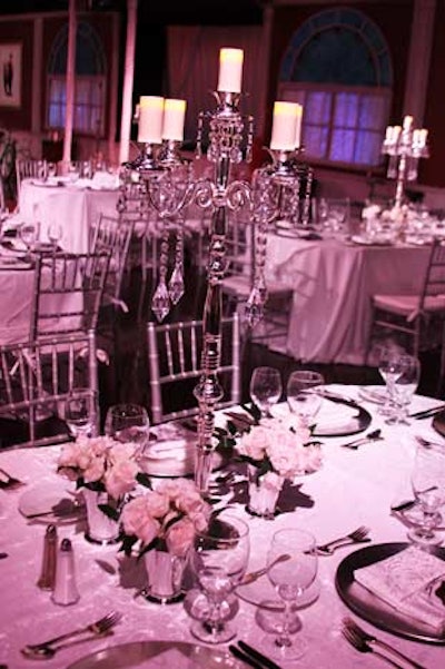 Each table had an 18-inch silver candelabra draped with strands of crystals.