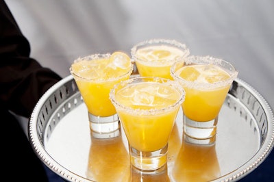 During the cocktail reception, servers passed silver trays of margaritas.