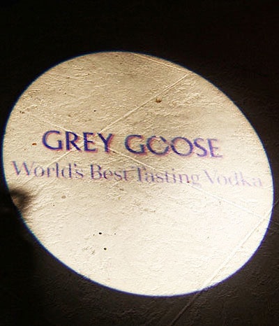 Sponsor Grey Goose projected its logo at various spots on the pool deck.