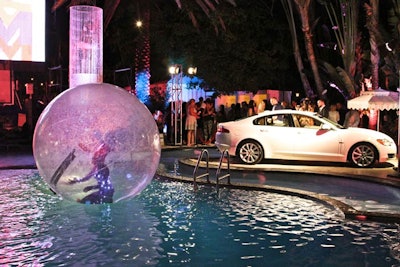 The entertainment included acrobats in large, clear plastic balls that floated around the pool.