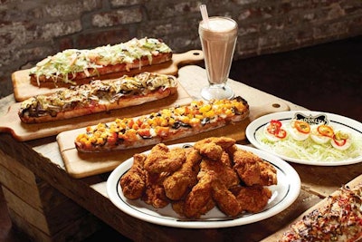 At a Bowling Alley: Egg shooters with pickled peppers and olive oil mayonnaise; fried chicken; assorted pizzas; and the Bourbon Street milkshake with Nutella from Brooklyn Bowl in New York