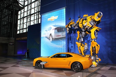 Exhibits on the concourse, including the Chevrolet Camaro and the Transformers: Dark of the Moon Autobot Bumblebee, provide additional incentive for showgoers to head from the main show floor on level three to the north pavilion.