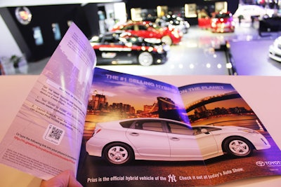 New to the Auto Show this year are QR codes, images from ScanBuy that can be scanned by mobile devices. The bar codes appear in ads, as well as in the show program (pictured).