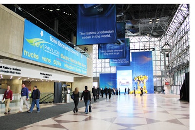 Signage hanging overhead in the north concourse of the Jacob K. Javits Convention Center helps guide attendees to Javits Center North, the newest display area of the New York International Auto Show.