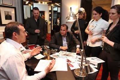 Bentley's senior interior designer Darren Day (pictured, far left) explained the design process to guests at the British automaker's cocktail event at the David Chu Bespoke Townhouse on Wednesday evening.