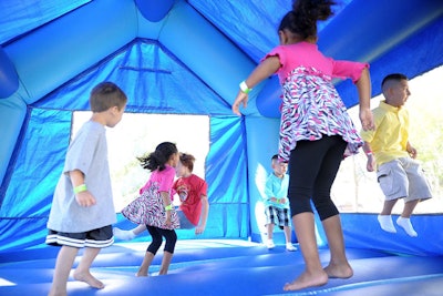 The carnival featured kid-friendly activities like a bounce house.