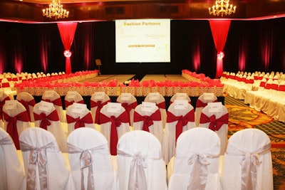 Organizers set up a stage on one side of the ballroom for the live auction and a fashion show.