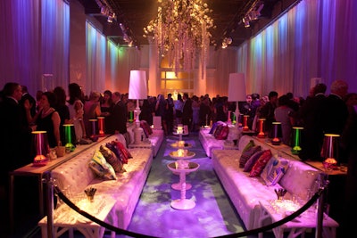 At the after-party, guests sat in lounge areas filled with tufted white sofas; tables were stocked with fixings for bottle service.