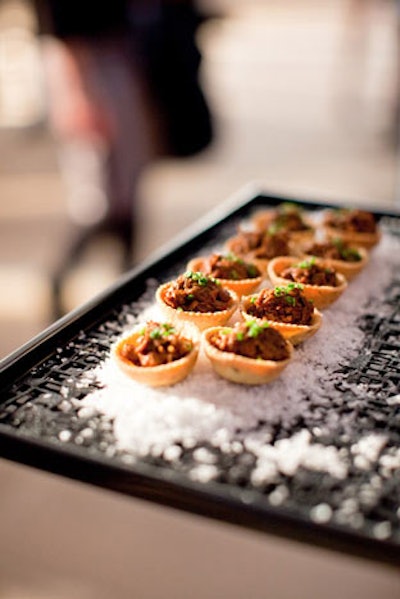 Dishes included bite-size pulled pork tacos with chocolate mole poblano (pictured), melted Brie and vanilla-scented green apple in puff pastries, mille-feuille with salted peanut and milk chocolate, and fleur de sel caramel with crackling sugar dust.