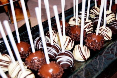 Wolfgang Puck served three flavors of chocolate lollipops using white, dark, and milk chocolate.