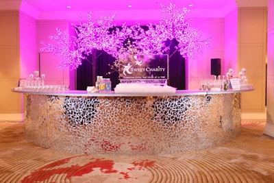 Syzygy set up a mirrored bar and illuminated pink cherry blossom trees just outside the main ballroom, where V.I.P. bartenders like the Wizard Girls served cocktails throughout the night.