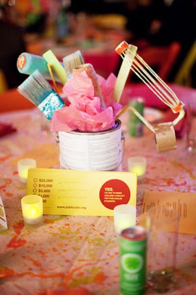 Tables in the dinner area were topped with colorful cans of Izze and paint-inspired centerpieces designed by Vadis Turner.
