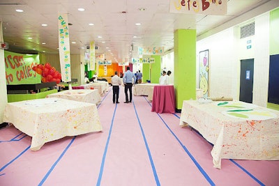 Set up with groupings of tables, the hallways of the school were used for cocktails and painting.
