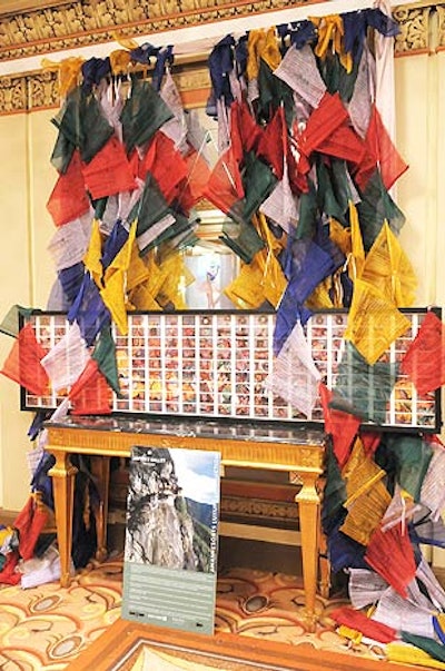 Outside the ballroom, a flag-filled display area advertised the live auction package, which included a seven-night stay in Bhutan and a two-night stay on the west coast of Phuket Island.