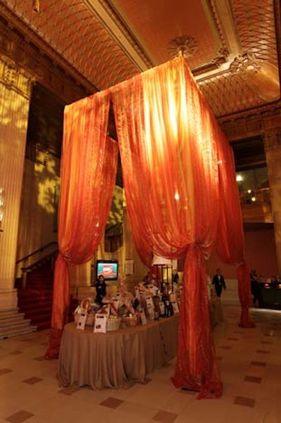 Canopies and lanterns hung over the silent-auction tables.