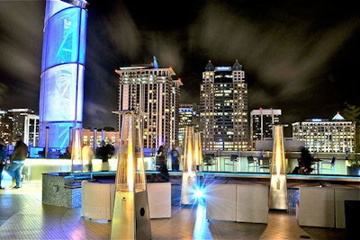 Several obelisk units on the terrace add light and low heat on cool nights.