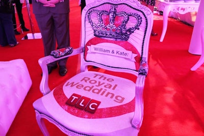 In a tongue-in-cheek move, the event planning and design team created thrones�'custom chairs decorated with an image of a crown.