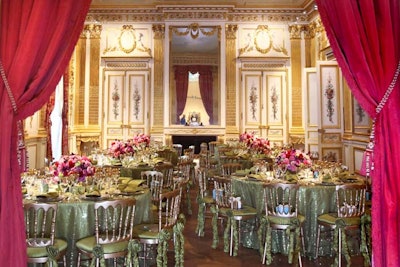 Occasions decorated the tables of the gilded-walled gallery with sparkling olive green linens surrounded by gold chairs.
