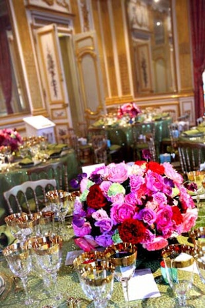 The gilded walls of one gallery inspired the gold flatware and gold-rimmed glasses Occasions incorporated into the place settings.