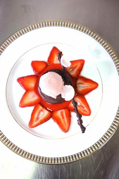 For dessert, Occasions served chocolate cake with carpaccio of sliced strawberries, topped with a dollop of strawberry sorbet, and garnished with a pistachio brittle crisp.