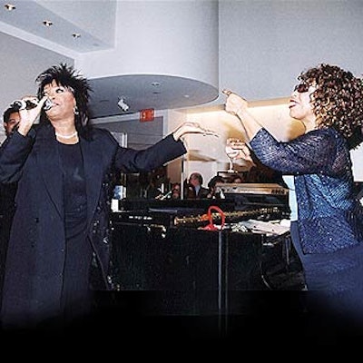 Patti LaBelle and Roberta Flack surprised Rosie O'Donnell with a performance at the party to celebrate Rosie magazine's first anniversary and the launch of O'Donnell's new book at the International Center of Photography. (Photo by Doug Goodman)