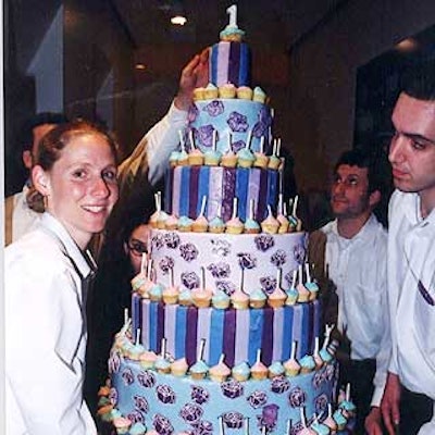 A seven-tiered cake was lined with mini cupcakes and topped with a #1 candle to celebrate the mag's first anniversary. (Photo by Doug Goodman)