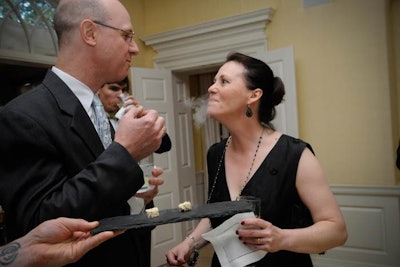 During the cocktail hour at David Bradley's home, guests got a kick out of José Andrés' smoking 'Dragon's Breath Popcorn,' made with liquid nitrogen.