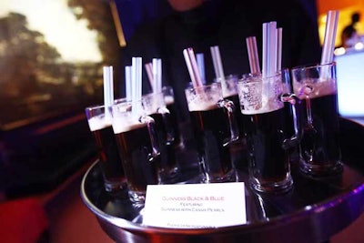 Occasions Caterers passed around 'Guinness and Black' cocktails topped with cassis pearls.