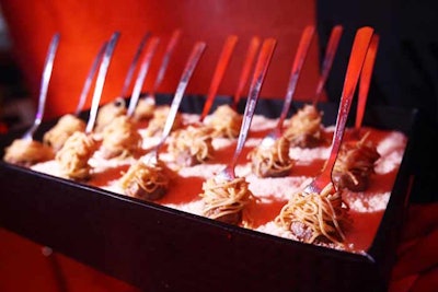 Also at the MSNBC after-party, Occasions passed veal and pork meatballs served on a fork with a twirl of spaghetti atop trays of grated Parmesan.