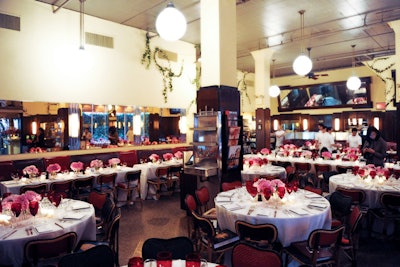 Chanel's dinner for the Artist Awards Program at the Tribeca Film Festival was a serene set of white tables, red banquettes (and matching water goblets), and simple arrangements of full blown peonies. The calm before the storm.