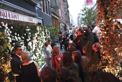 I hate celebrity cattle call photo areas, but at least Chanel ditched the vinyl sign and gave bold face namers a wall of roses in ivory and white to stand in front of. I watched Jeff Koons enter the regular entrance, then go back out and re-enter to get his picture taken in front of this installation. Maybe it reminded him of his Bilbao 'Puppy'?