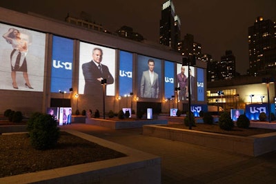 Bentley Meeker projected Robert Maxwell's USA photographs onto Lincoln Center once the sun set.