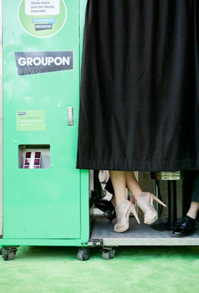 Guests posed for photos in a Groupon-branded booth.