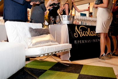 A small champagne lounge offered a few seats and stations proffering bubbly.