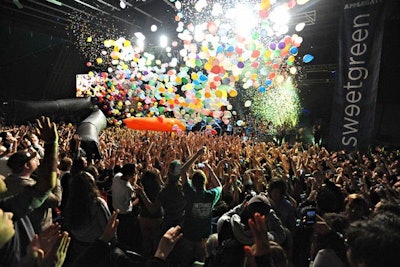 Multicolored balloons and confetti dropped from the rafters onto the crowd during Girl Talk's finale.