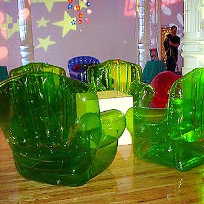 The green lounge was decorated with large green inflatable chairs and green star projections.