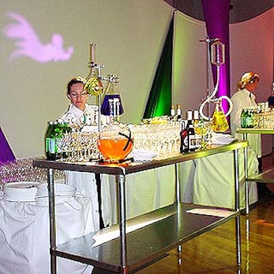 A laboratory-themed bar offered cocktails from lab-coat clad bartenders behind steel lab tables.