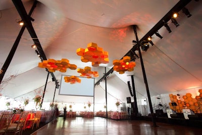 Event Creative designer Jeffrey Foster suspended bright golden honeycombs over the dance floor.