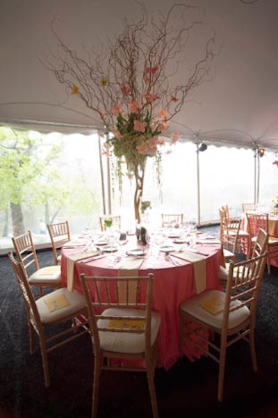 One tabletop design incorporated peach French tulips and origami butterflies.