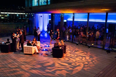 Lounge areas and patterned lighting spruced up the museum's waterside plaza.
