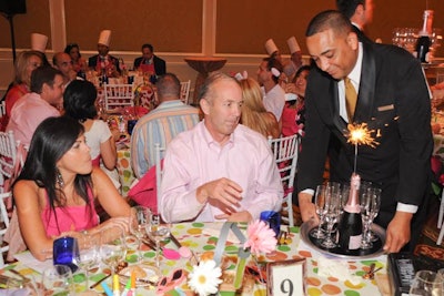 Guests who pledged to purchase a table for the 2012 gala were thanked with a bottle of champagne.