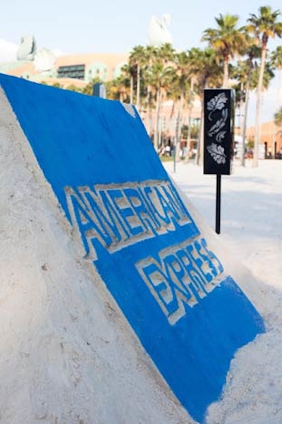 Team Sandtastic created a sand sculpture of the American Express logo.