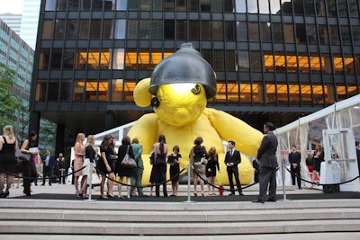 Artfully rendered in bronze, Urs Fischer's sculpture 'Untitled (Lamp/Bear)' sits in Seagram Plaza and will remain there until September. Taking advantage of the art's spacious location, Christie's held its event in tents placed around the 23-foot-tall structure.