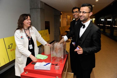 The Science Centre deceived guests' senses, encouraging them to explore and learn at interactive stations, including one that involved plunging a hand into ice water.