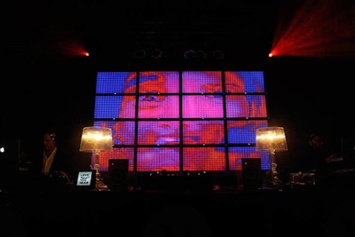 A backdrop of 16 LG screens flanked the DJ booth, displaying sense-related images like eyes, ears, mouths, and noses.
